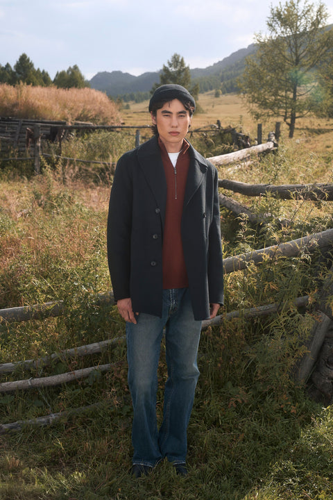 Men's Seamless Cashmere Half-Zip Sweater in Navy, editorial photo