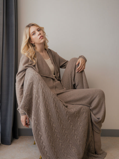Cable Knit Cashmere Blanket in Light Gray, editorial photo