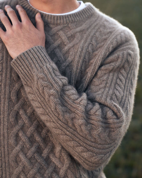 Cashmere Aran Cable-Knit Crewneck Sweater in Taupe, editorial photo