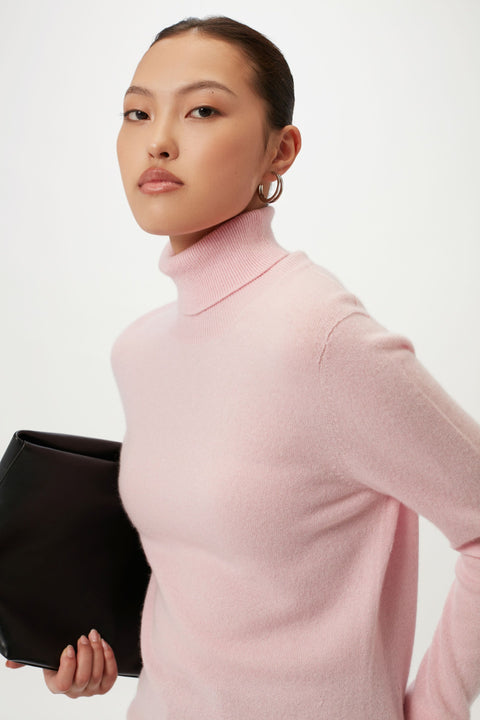 Timeless Cashmere Turtleneck Sweater in White, editorial photo