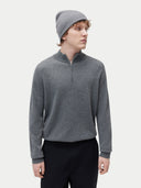 man wearing a gray beanie, sweater and black pants #color_dim-gray