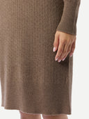 a zoomed-in shot of a brown ribbed knit dress worn by a person on a white background #color_taupe