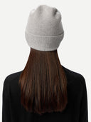 back view of a woman wearing a gray knit beanie with a plain background #color_high-rise 