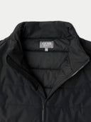 Black puffer jacket with 'Gobi' brand label on a light gray background  #color_black