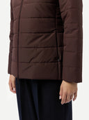 close up of a brown puffer jacket worn by a person on a white background #color_vineyard-wine