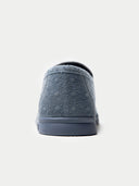 Blue slip-on shoe with textured surface on a white background #color_steel-gray