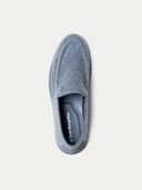 Gray slip-on shoe with 'Mongolian' branding on a white background #color_steel-gray