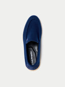 top side of a navy slip-on shoe with 'True Mongolian.' branding on a light gray background #color_navy