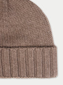 close up of a brown knit beanie #color_taupe