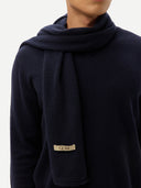 Navy blue scarf with a visible brand label on a white background #color_navy-blazer