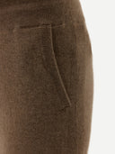 close up of a taupe colored cashmere jogger pants with side pockets.