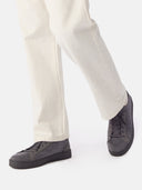 side view of white pants and gray knitted sneakers #color_frost-gray