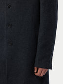 Dark gray coat with button details on a white background #color_charcoal