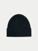 Black beanie hat on a light gray background #color_black