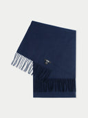 A navy blue cashmere fringed scarf with tassels displayed flat. #color_navy