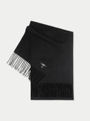 A black cashmere fringed scarf laid out flat. #color_black