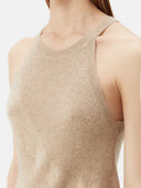 close up of a beige sleeveless crew neck top #color_warm-grey