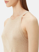 close up of a beige sleeveless round neck knitted top #color_beige