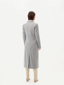 back view of a gray long coat white white boots #color_vapor-blue