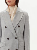 close up of a gray double breasted cashmere coat #color_vapor-blue