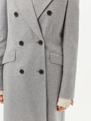 close up of a gray double breasted cashmere coat #color_vapor-blue