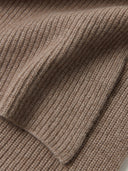 Close-up of a brown knitted fabric texture #color_taupe