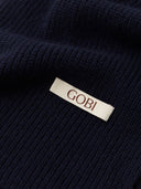 Navy blue fabric with a 'Gobi' label #color_navy-blazer