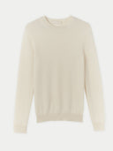 A beige-colored, crew neck sweater. #color_off-white