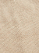 close up of a beige fabric of beanie hat #color_beige