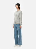 side view of a gray cardigan with blue jeans, woman model #color_dawn-blue