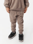 children wearing brown cashmere pants with matching sweater #color_taupe