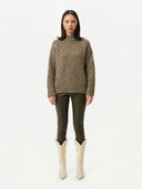 front view of a green high neck sweater with pants  #color_capulet-olive