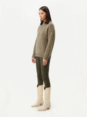 side view of a green sweater and pants  #color_capulet-olive