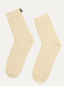 Pair of beige socks on a white background #color_beige