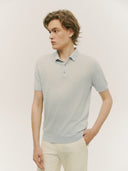 man wearing a gray polo shirt and pants #color_vapor-blue