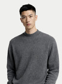 close up front view of Man wearing a gray sweater against a plain background #color_plum-kitten