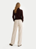 back view of a brown sweater and beige pants on a white background #color_coffee-bean