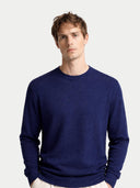 Man wearing a blue sweater on a white background #color_navy-blazer