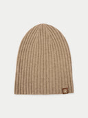 Beige knit beanie with a brand logo on a light gray background #color_taupe