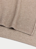 Close-up of a beige fabric texture on a white background #color_taupe
