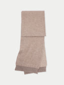 Folded beige scarf on a white background #color_taupe