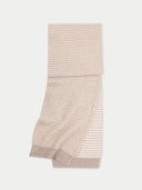 Beige knitted scarf on a light gray background #color_warm-grey