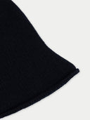 Black ribbed knit fabric on a white background #color_black