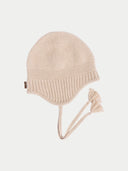 Beige knitted hat with earflaps on a light gray background #color_beige