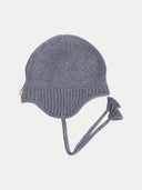 Gray knit baby hat with a tie on a light gray background #color_dim-gray