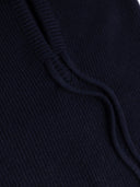 Close-up of a dark blue fabric texture #color_navy-blazer