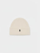 Beige knit beanie with a small logo on a light gray background #color_beige