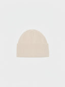 Beige knit beanie on a light gray background #color_beige