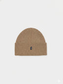 Beige knit beanie with a small logo on a white background #color_taupe