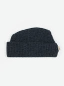 flat lay of a dark gray cuffed beanie #color_charcoal